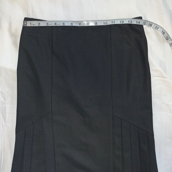 BeBe Skirt, Size 2. Good used condition. Pleaded on the sides. Runs big - Picture 3 of 6